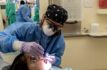 Dental clinician working on a patient.